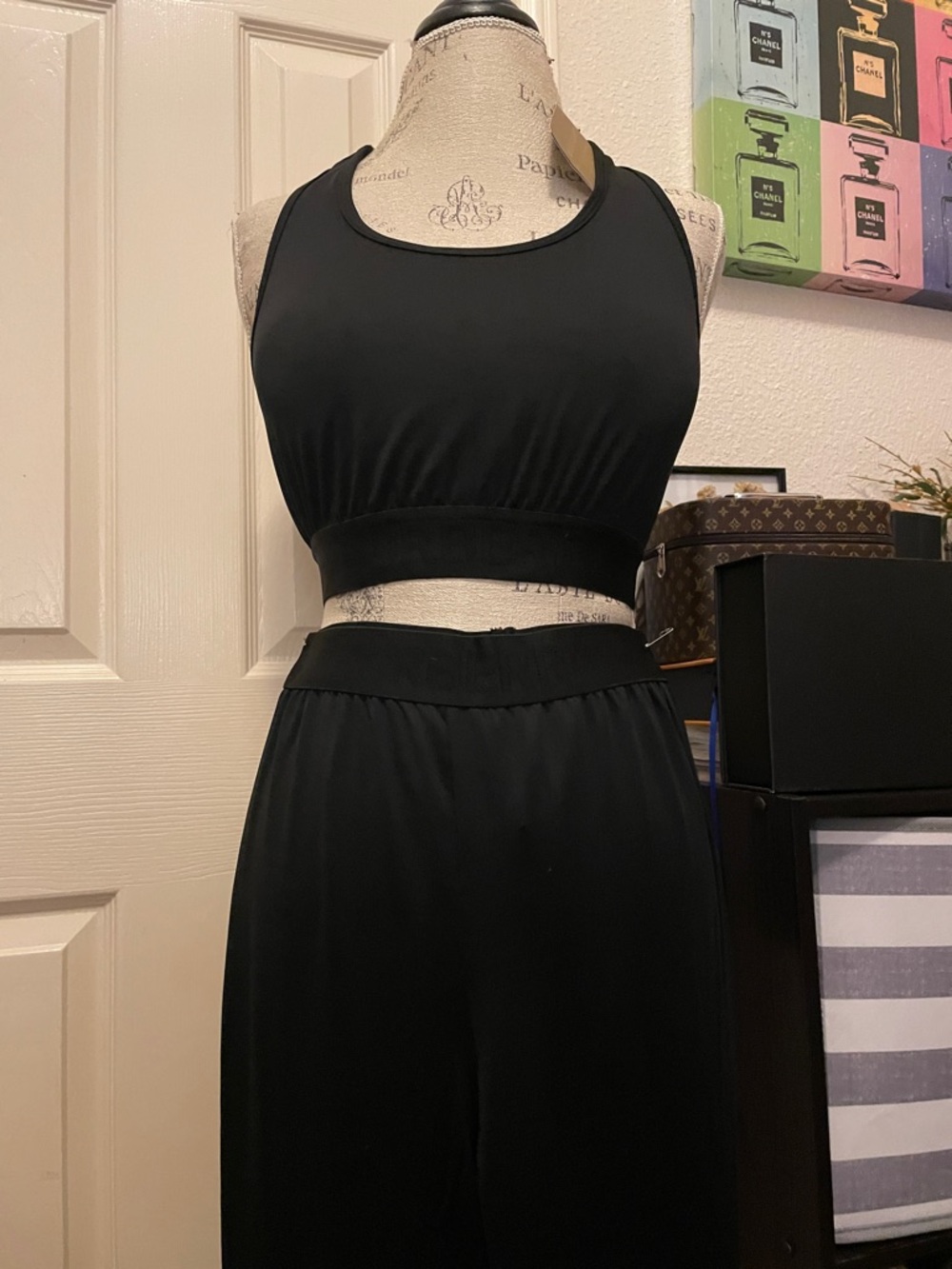 Black Tank Top with Branded Tag. Says Xl more like med large **closet clearout .